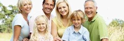 A family smiling at the park | Chesterfield Dentist
