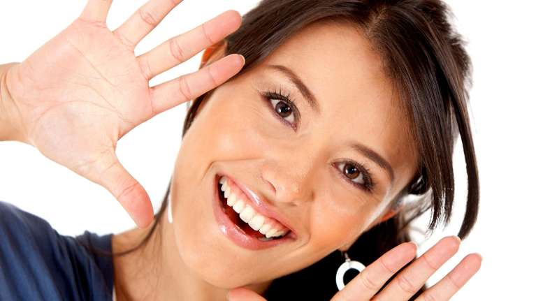 A smiling woman on a white background | dentist Chesterfield