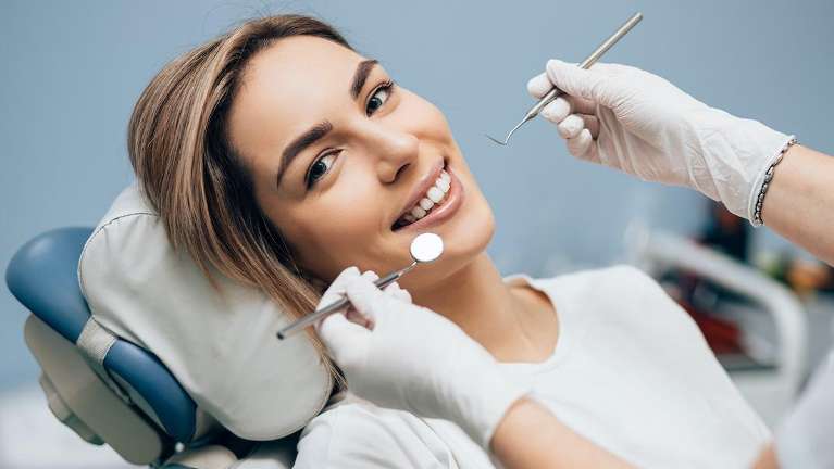 A woman getting a dental exam