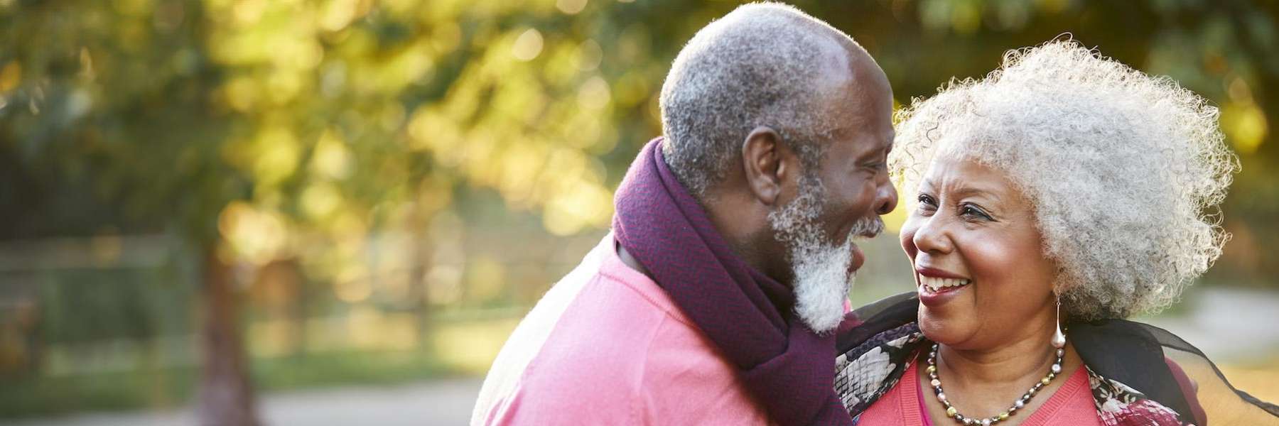 A smiling elderly couple
